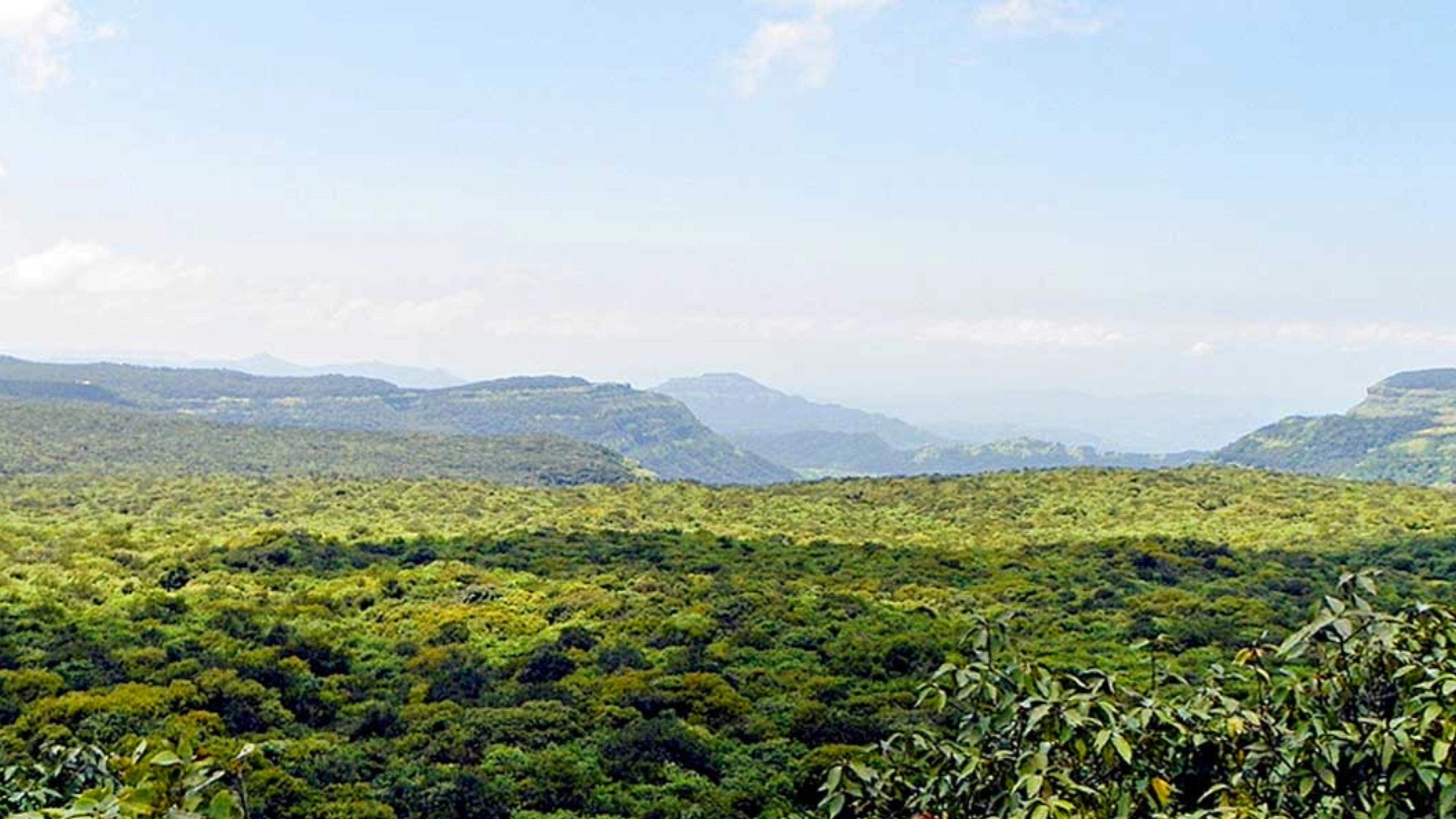 Green landscape and hills visible from Connaught Peak Point, a nearby attraction of Ramsukh Resort, Mahabaleshwar.